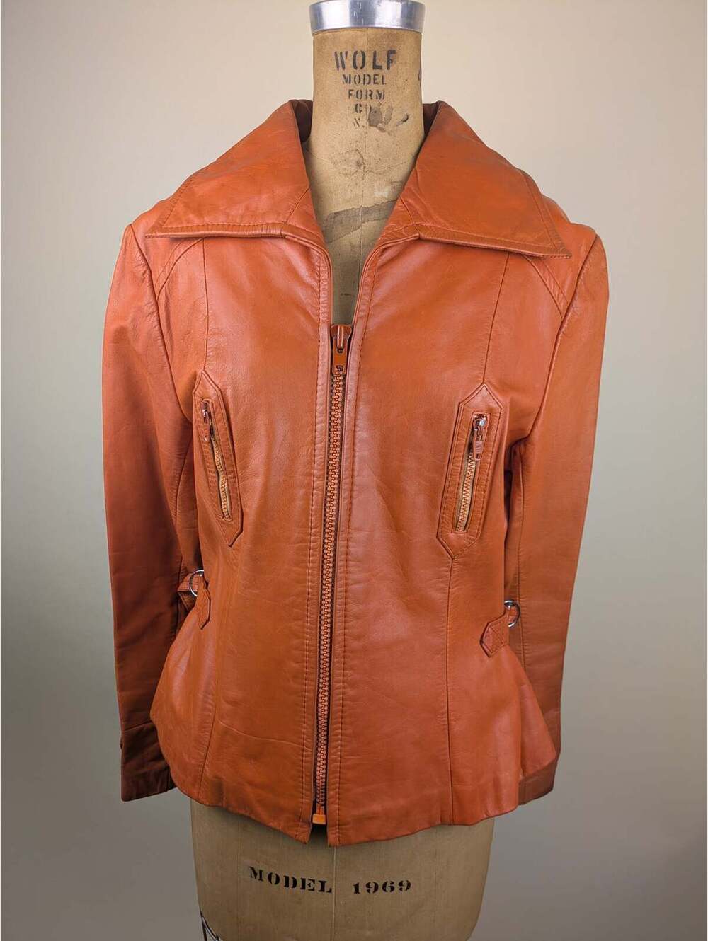 1970's split end orange leather jacket